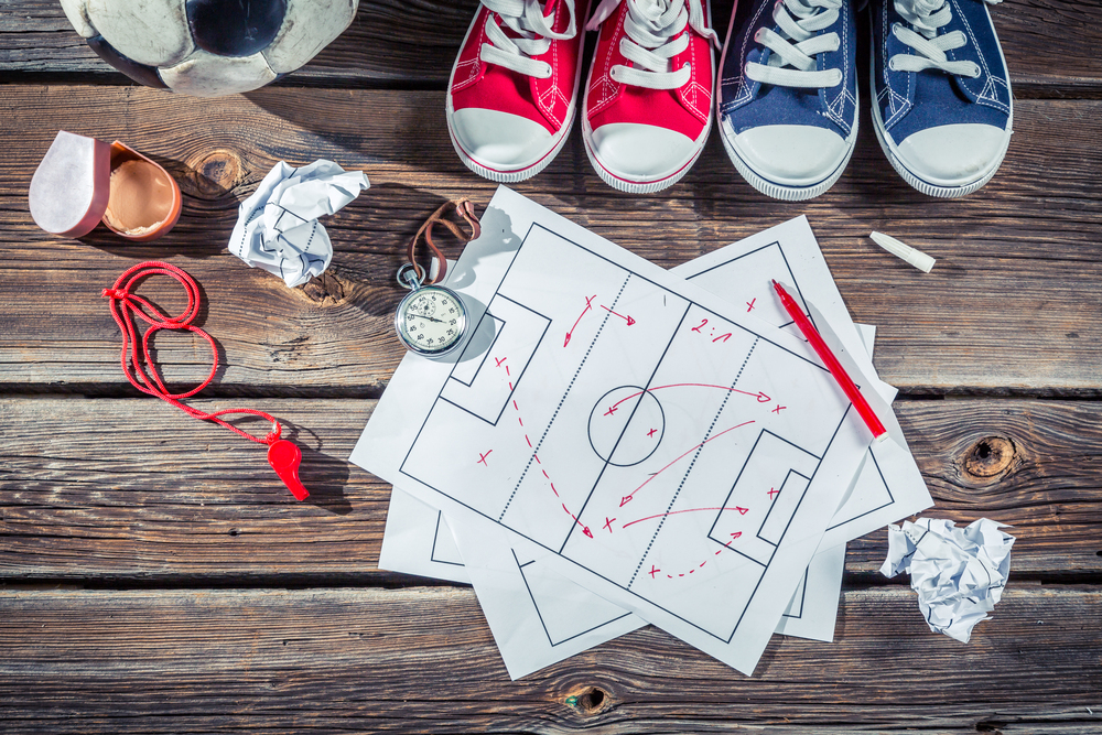 Soccer formation tactics on school desk